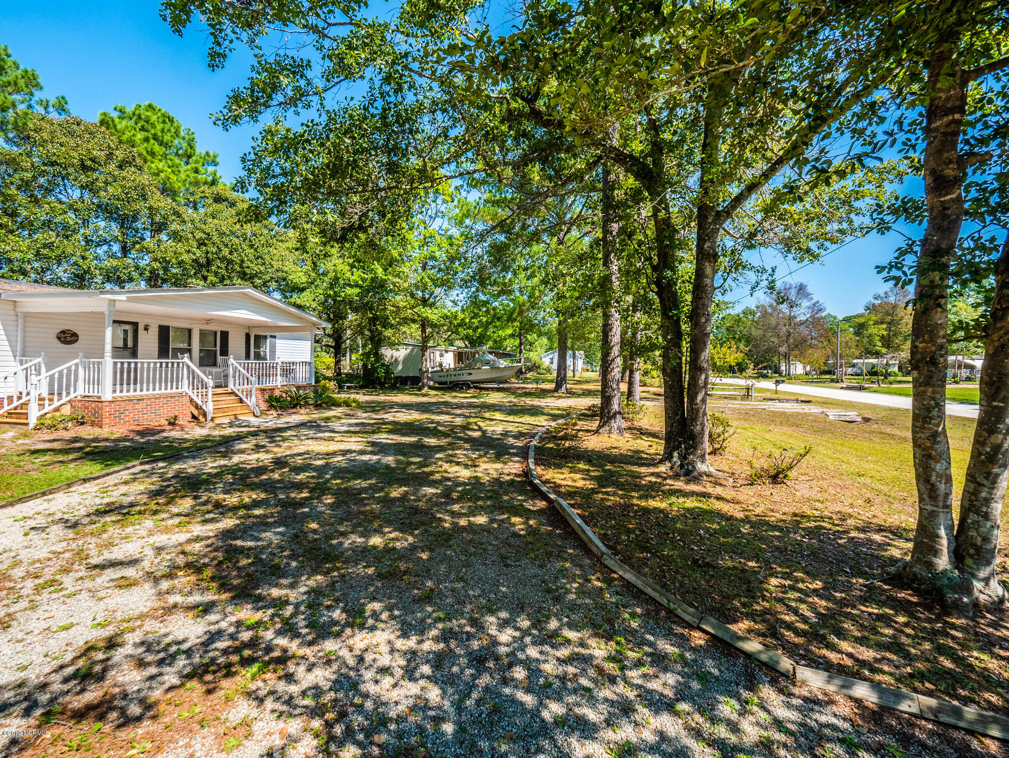 211 Doe Ridge Road Hampstead, NC 28443 - Photo 26 of 27 Great driveway leading up to home.