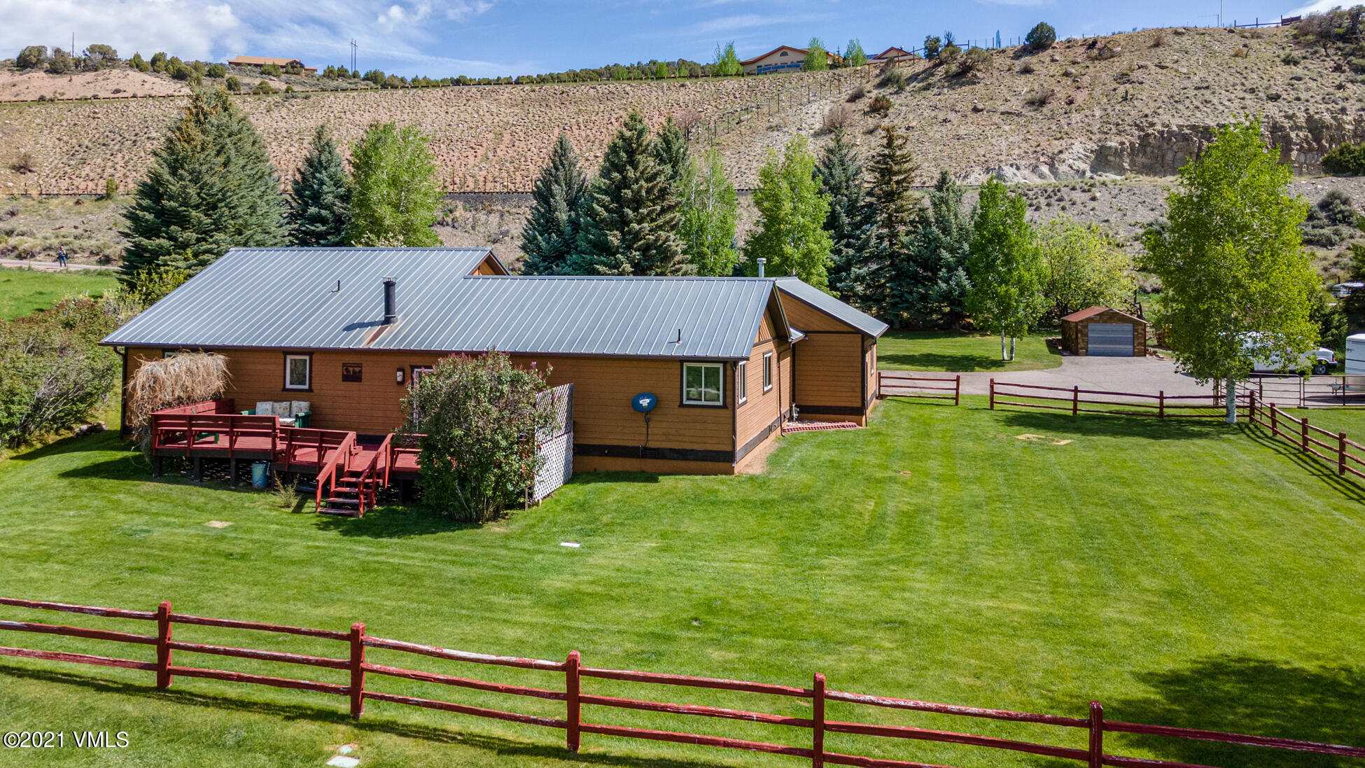 385 Edwards Access Road Edwards, CO 81632 - Photo 12 of 37 a view of house with garden and trees