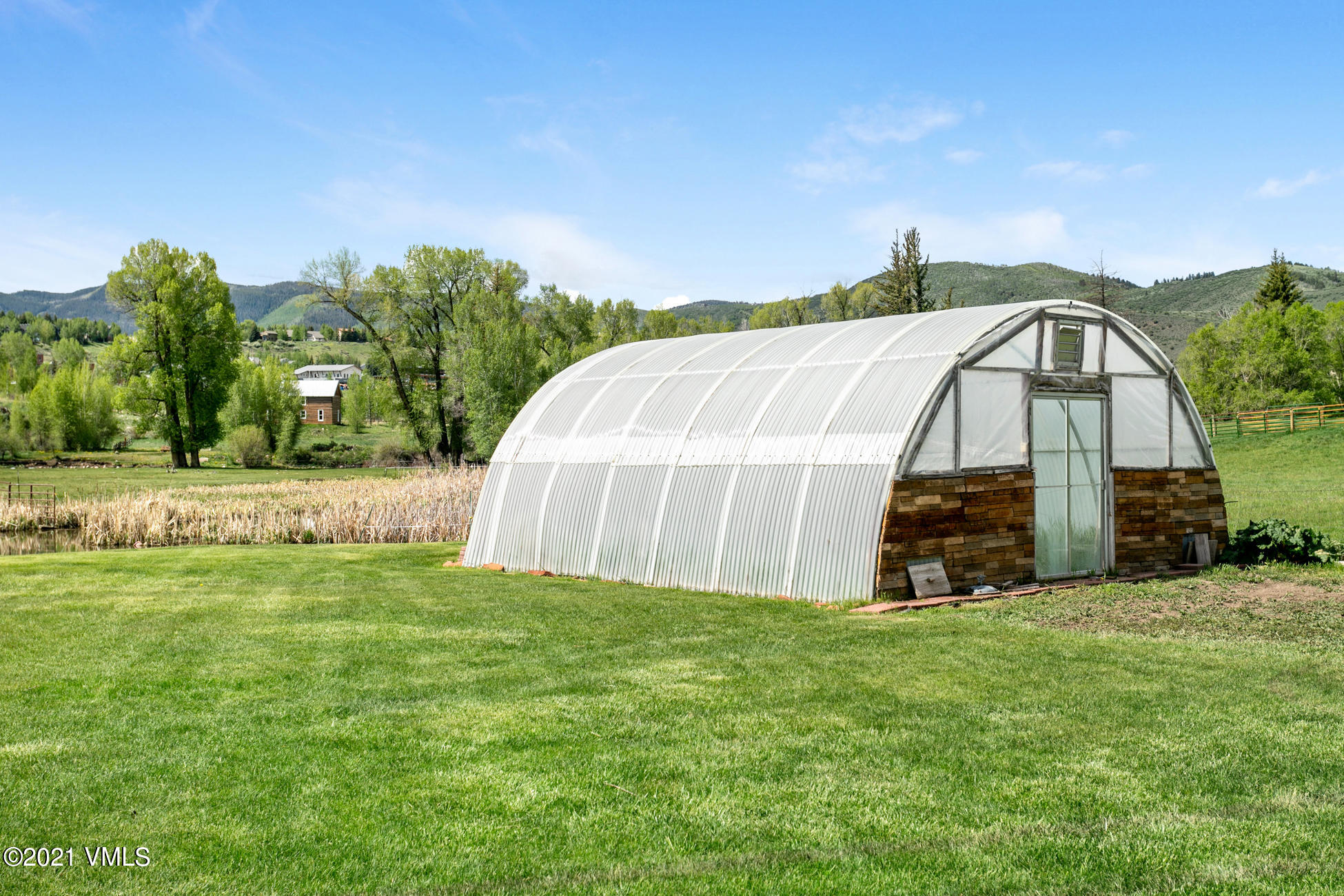 385 Edwards Access Road Edwards, CO 81632 - Photo 13 of 37 a view of a garden with large trees