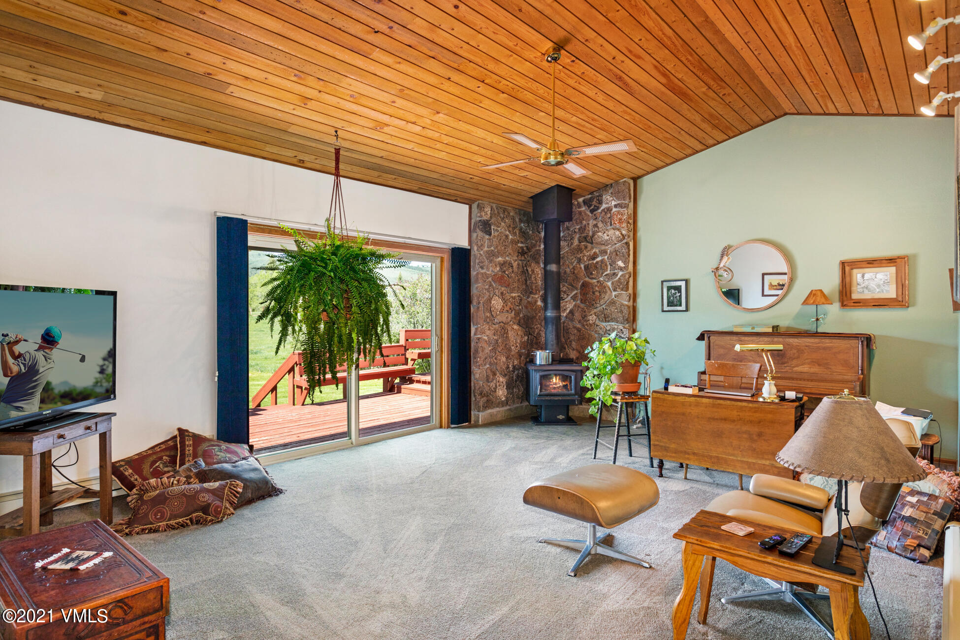 385 Edwards Access Road Edwards, CO 81632 - Photo 28 of 37 a living room with furniture and a large window