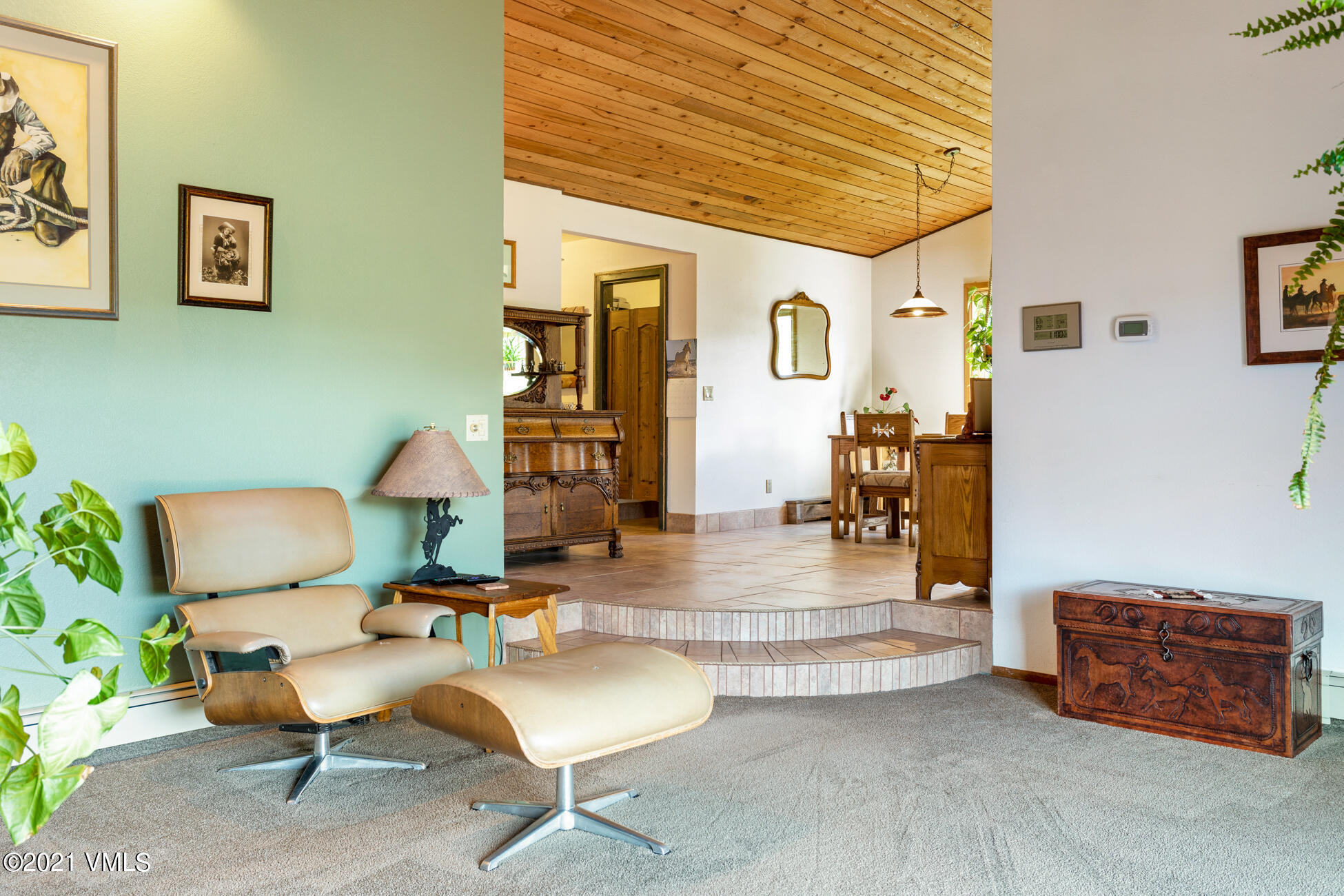 385 Edwards Access Road Edwards, CO 81632 - Photo 30 of 37 a living room with furniture and wooden floor