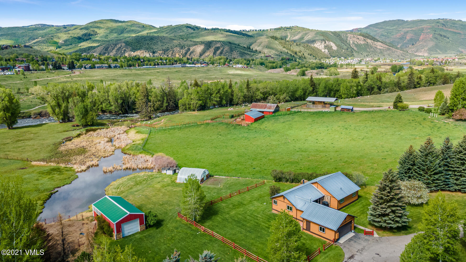 385 Edwards Access Road Edwards, CO 81632 - Photo 3 of 37 a view of lake with houses