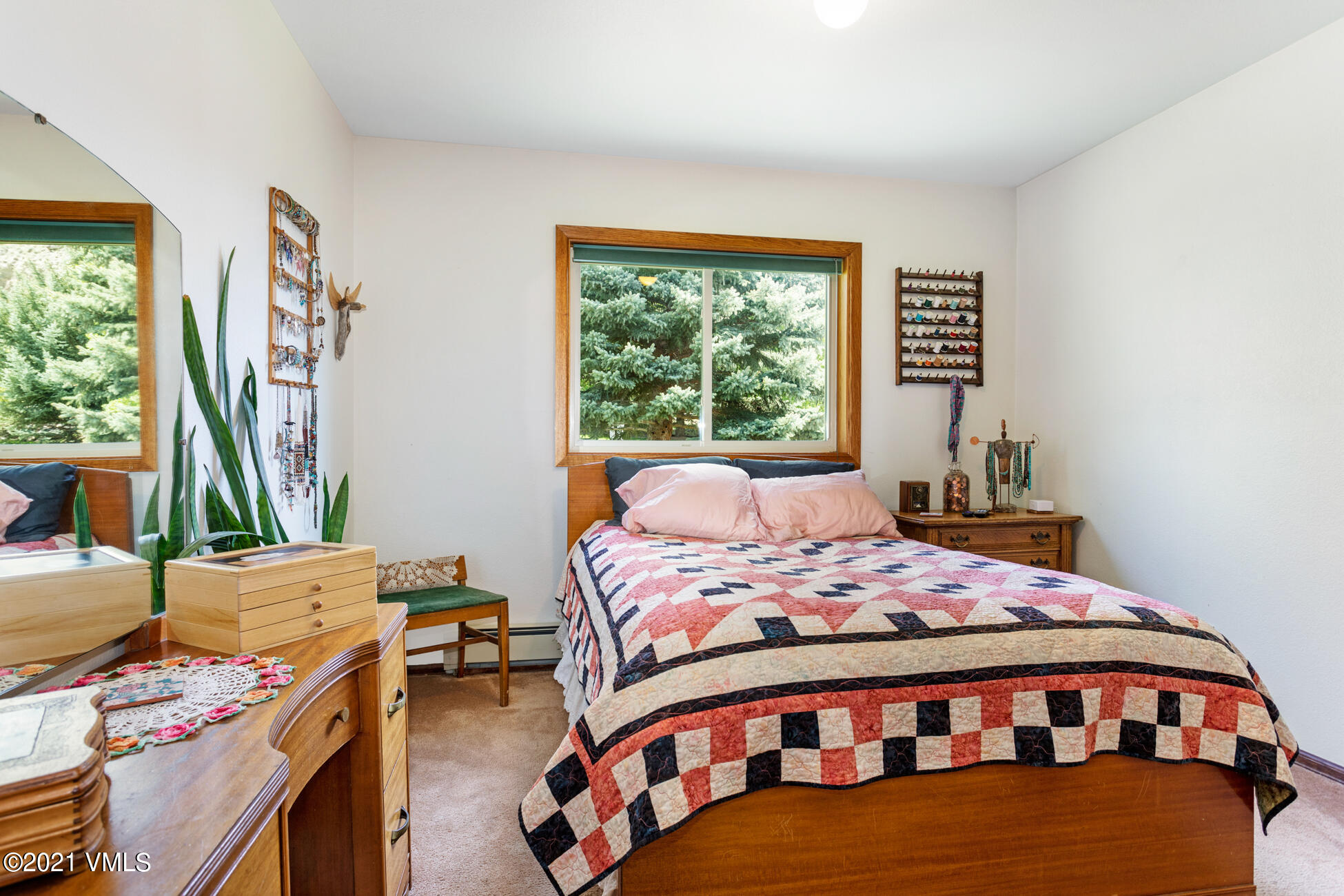 385 Edwards Access Road Edwards, CO 81632 - Photo 31 of 37 a bedroom with a bed and a window