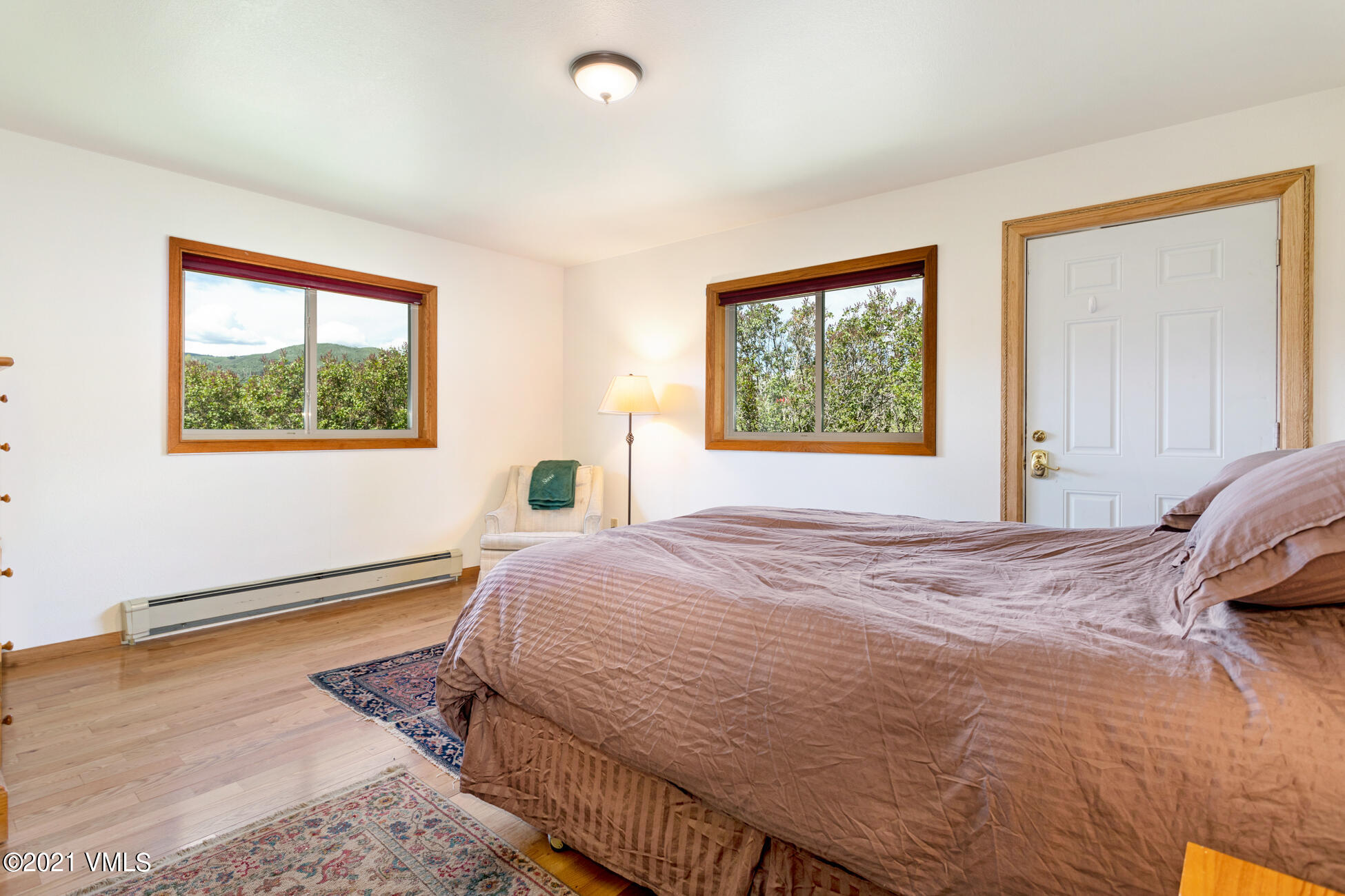 385 Edwards Access Road Edwards, CO 81632 - Photo 32 of 37 a bedroom with a bed and a window