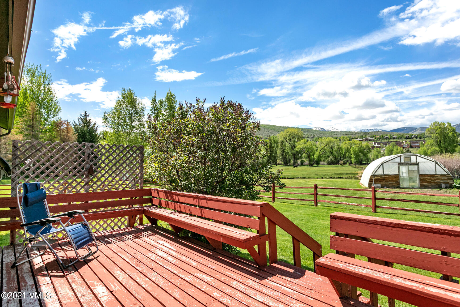 385 Edwards Access Road Edwards, CO 81632 - Photo 36 of 37 a view of a balcony with wooden floor and outdoor seating