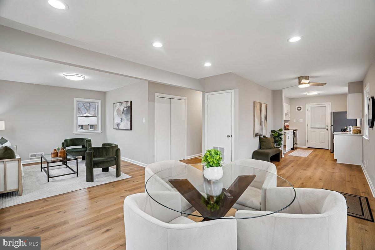 3921 Lantern Drive Silver Spring, MD 20902 - Photo 12 of 46 a living room with furniture and wooden floor