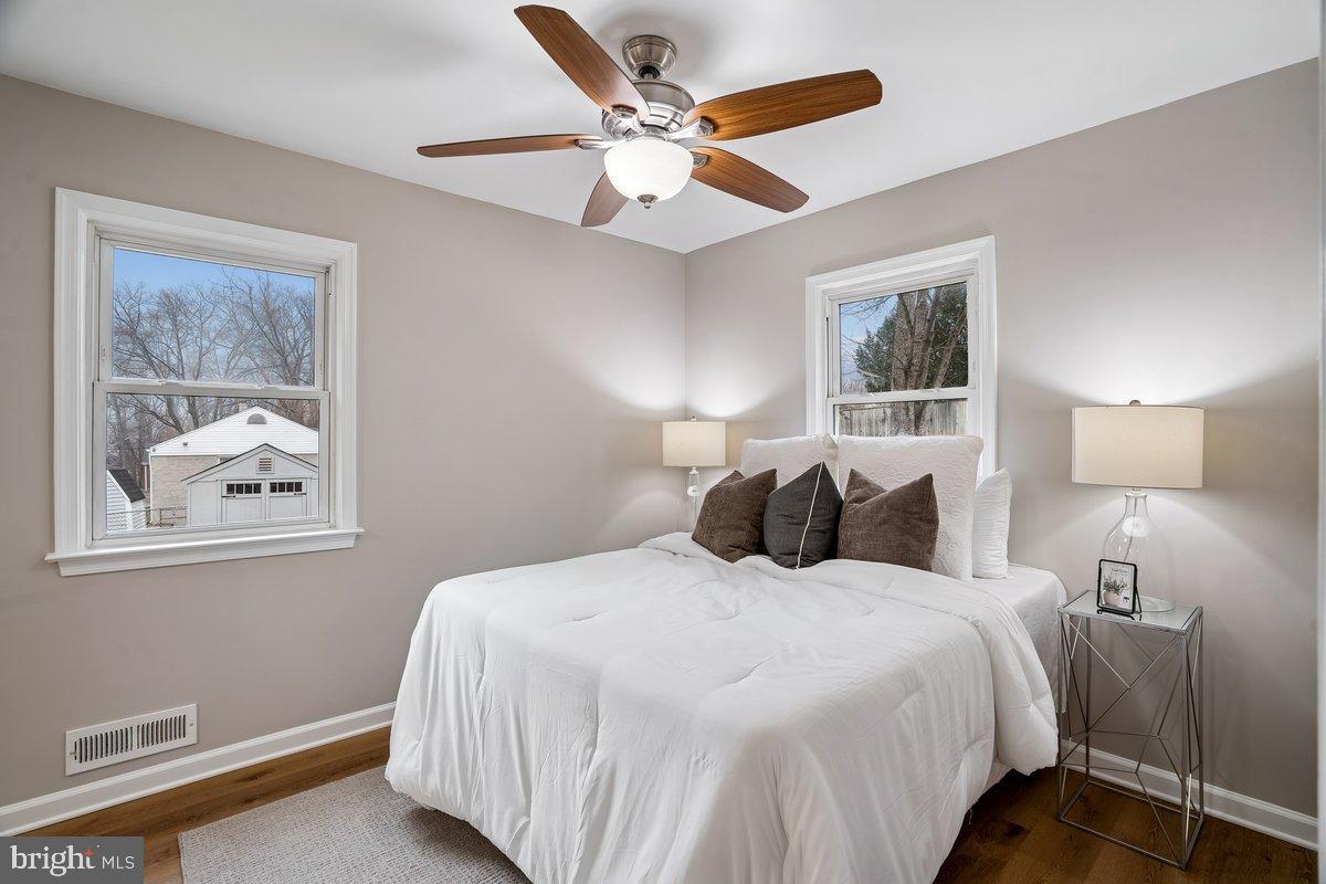 3921 Lantern Drive Silver Spring, MD 20902 - Photo 15 of 46 a bedroom with bed and window