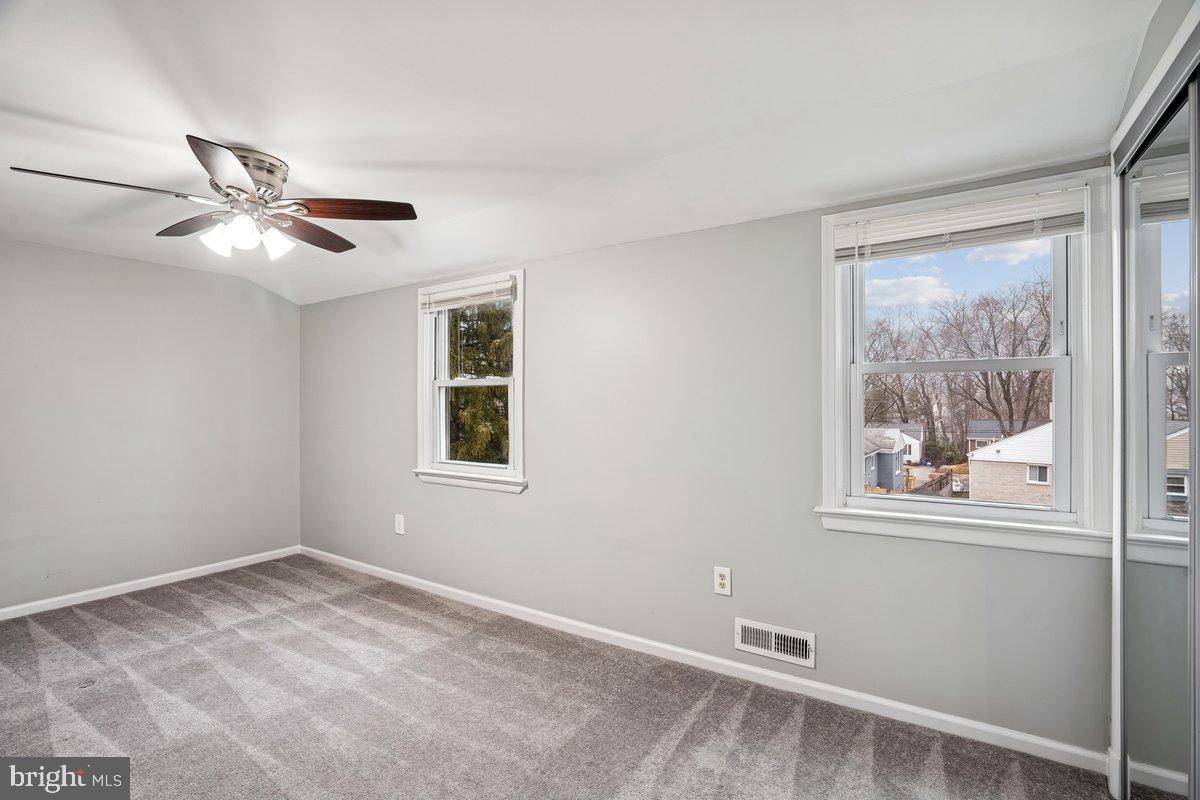 3921 Lantern Drive Silver Spring, MD 20902 - Photo 23 of 46 a view of an empty room with a window