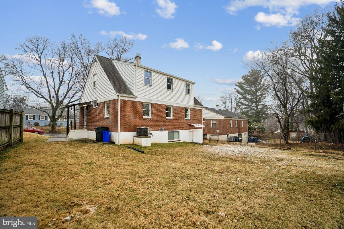 3921 Lantern Drive Silver Spring, MD 20902 - Photo 36 of 46 a view of a house with a yard