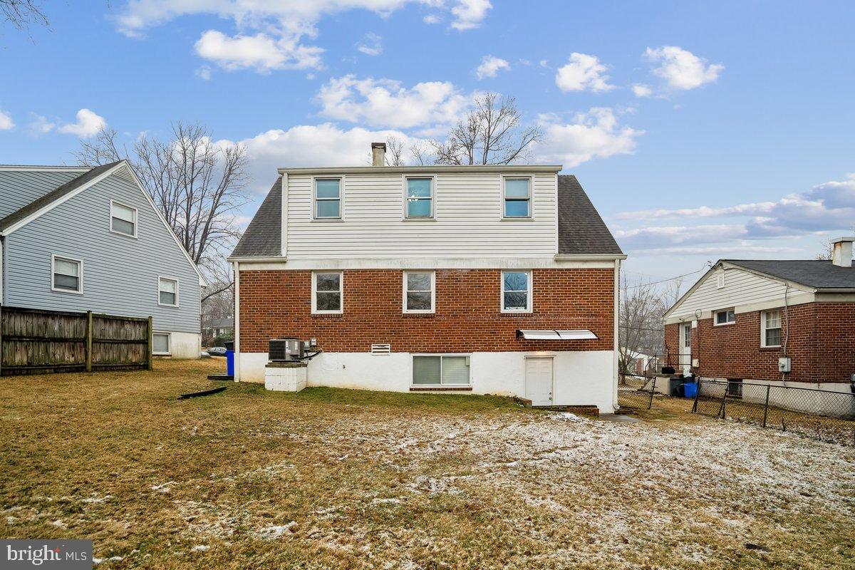 3921 Lantern Drive Silver Spring, MD 20902 - Photo 37 of 46 a front view of a house with a yard