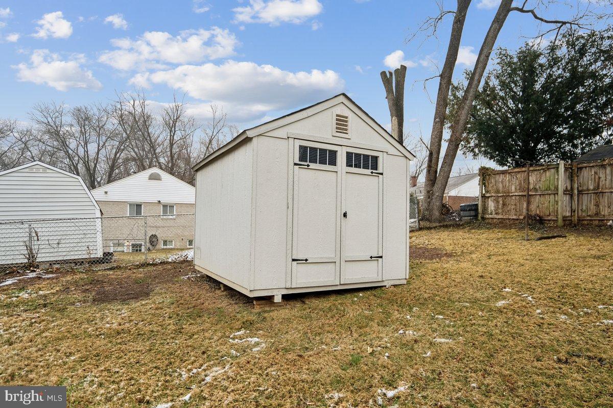 3921 Lantern Drive Silver Spring, MD 20902 - Photo 39 of 46 a view of a house with a yard