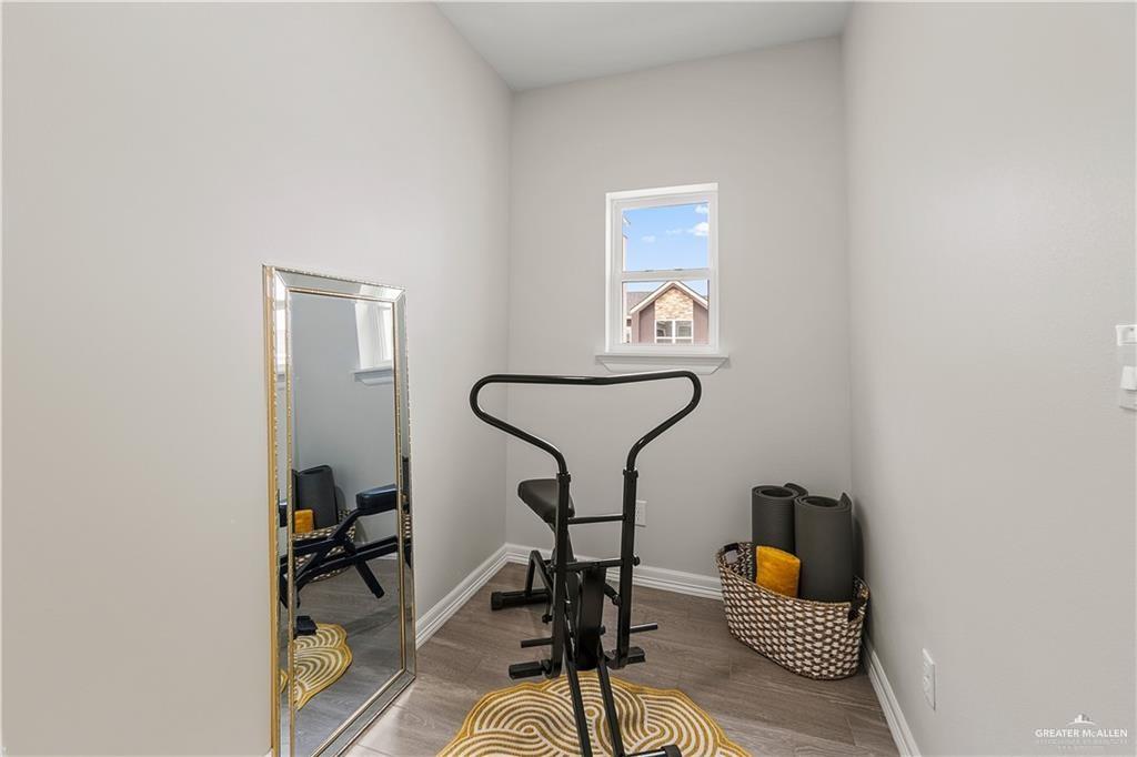 5516 North Crown Point Pharr, TX 78577 - Photo 16 of 27 a room with table and chairs