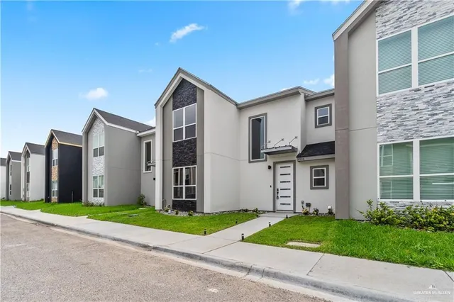 a front view of house with yard
