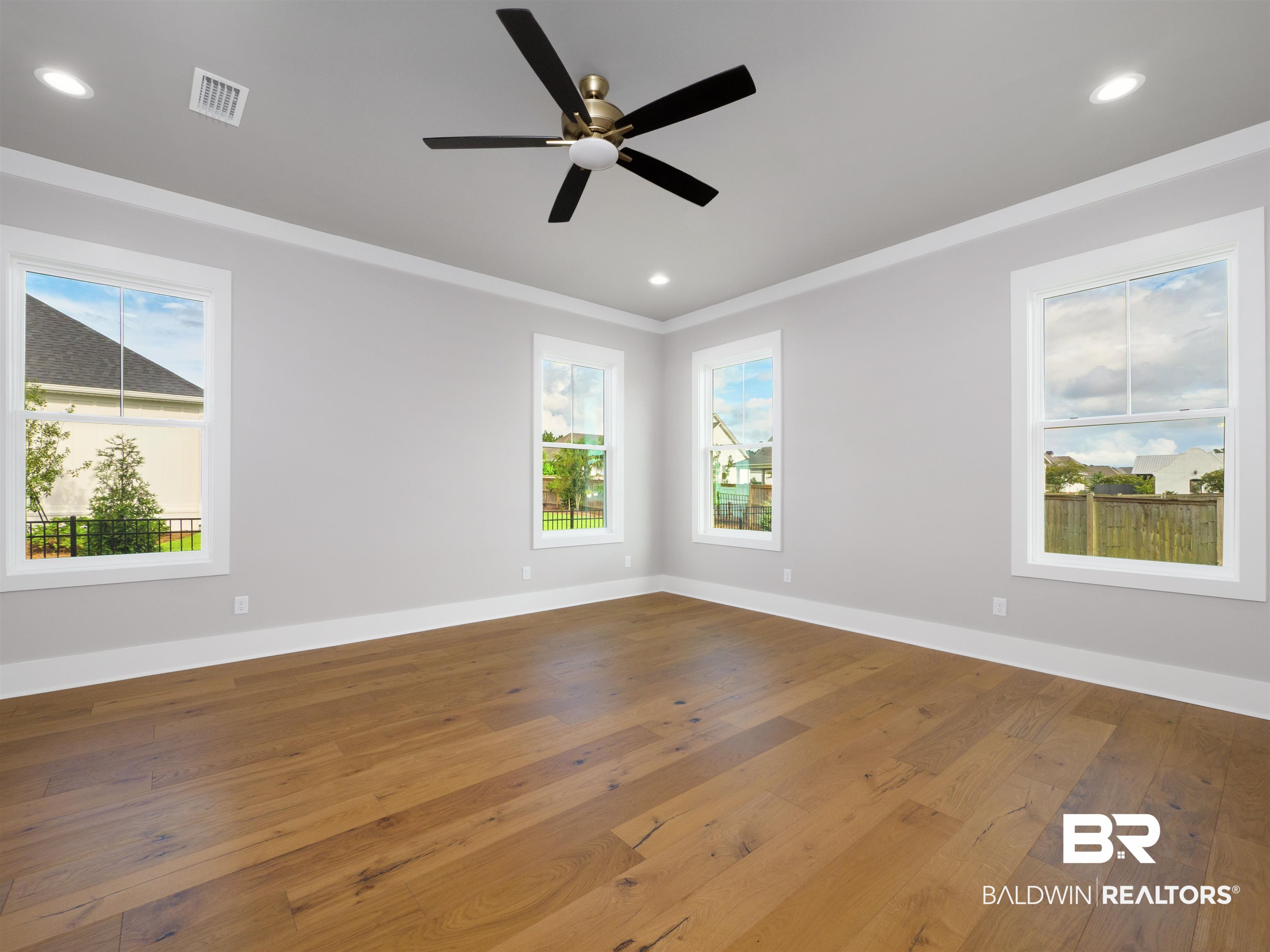 10912 Catania Avenue Fairhope, AL 36532 - Photo 17 of 54 The primary bedroom overlooking the back yard