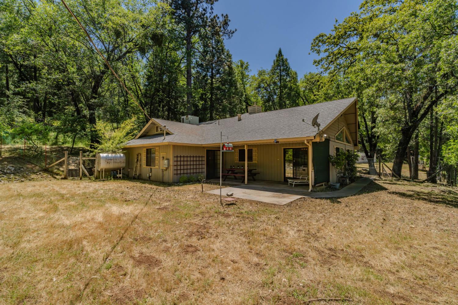 20310 State Rte 26 West Point, CA 95255 - Photo 43 of 57 a house with trees in the background