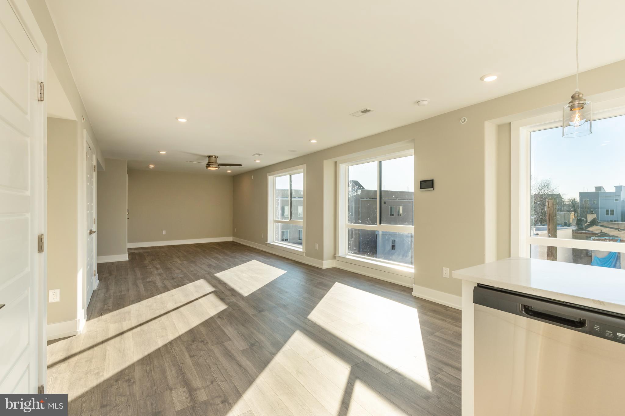 2517 Hope Street, Unit 4 Philadelphia, PA 19133 - Photo 1 of 35 a view of an empty room and a window