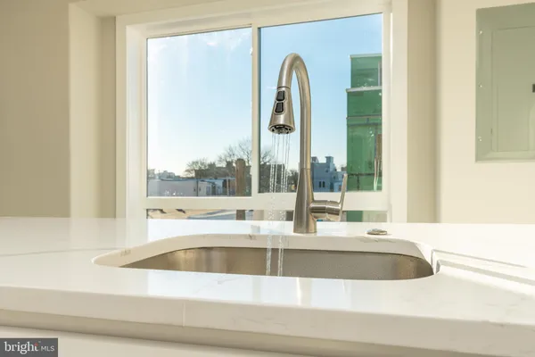 a view of a tub sitting in a bathroom