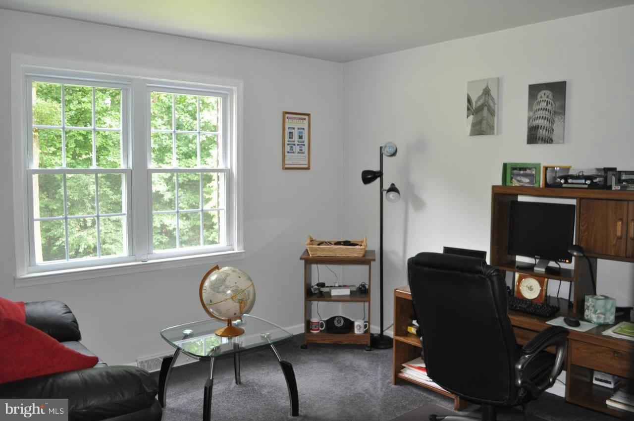 2531 Plum Point Road Huntingtown, MD 20639 - Photo 11 of 30 a view of hall way with furniture and a window