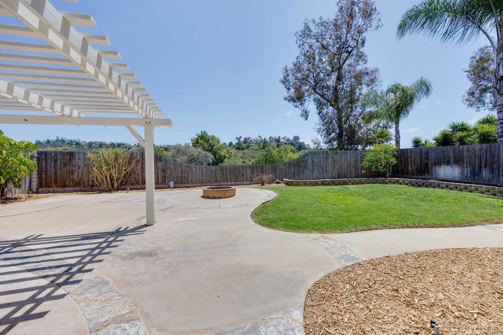 4595 Blackwell Road Oceanside, CA 92056 - Photo 38 of 47 a view of a backyard with sitting area