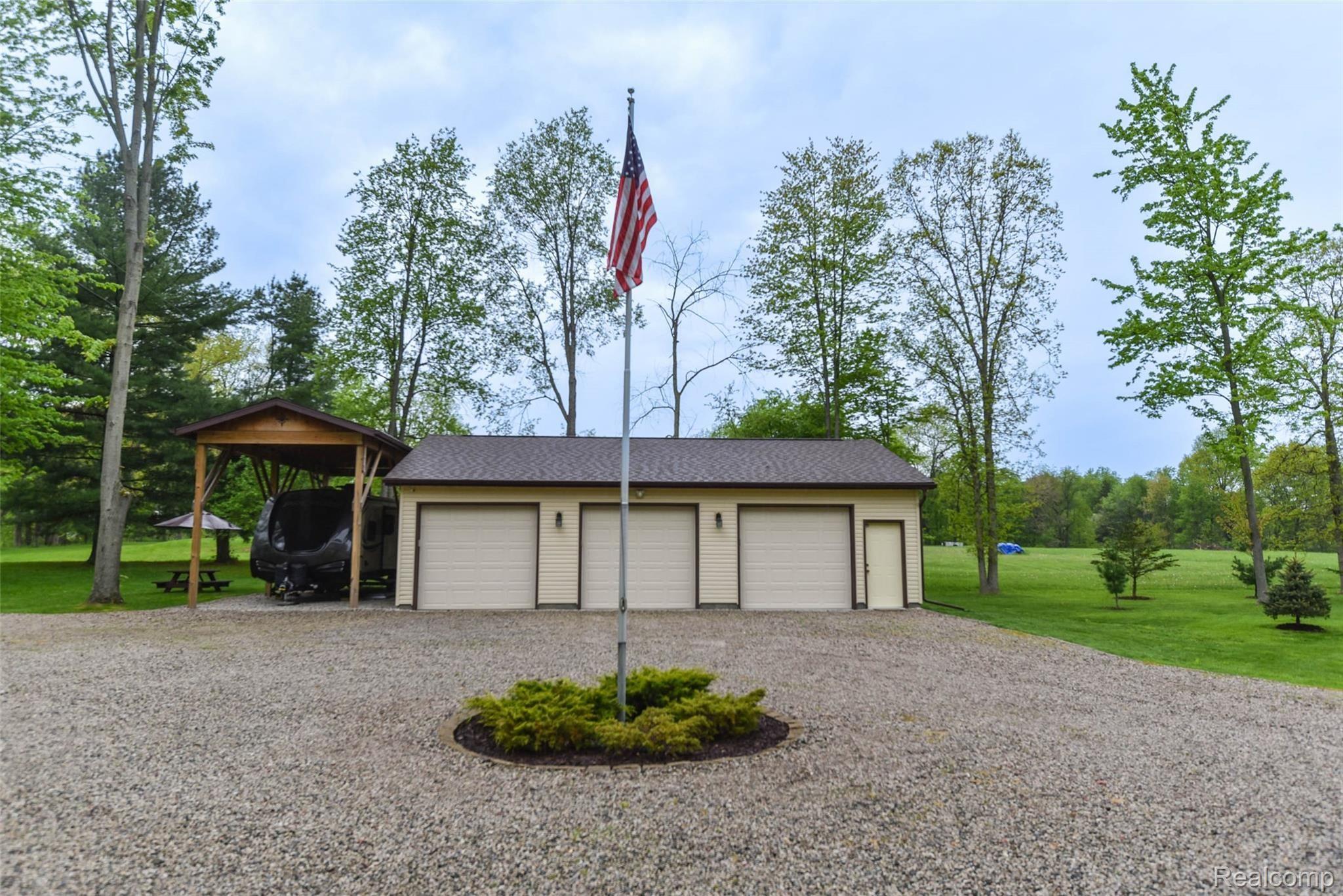 5520 Lowe Road Fowlerville, MI 48836 - Photo 80 of 86 5520-W-Lowe-Rd-66 Outside Garage.jpg