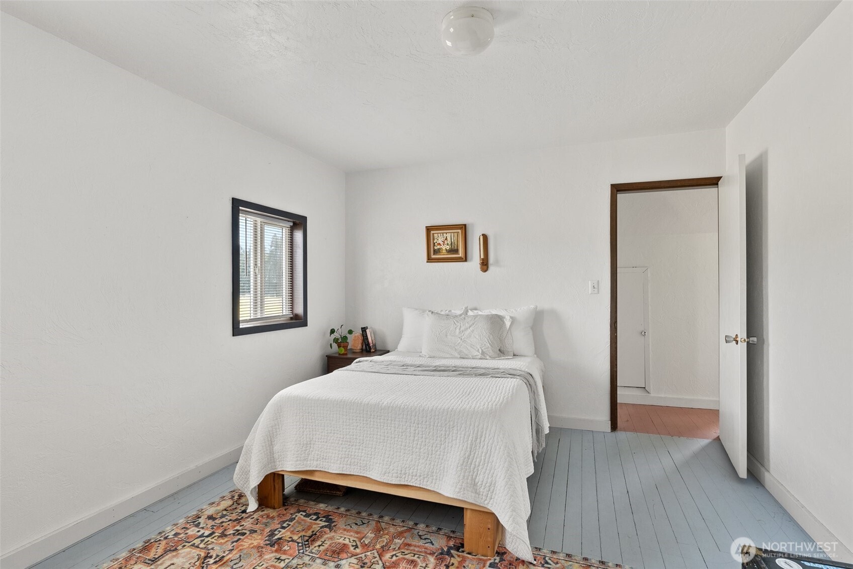 953 Boistfort Road Curtis, WA 98538 - Photo 20 of 40 a bedroom with a bed and a window