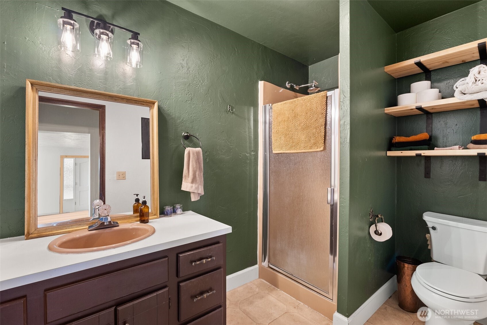 953 Boistfort Road Curtis, WA 98538 - Photo 21 of 40 a bathroom with a sink vanity mirror and toilet