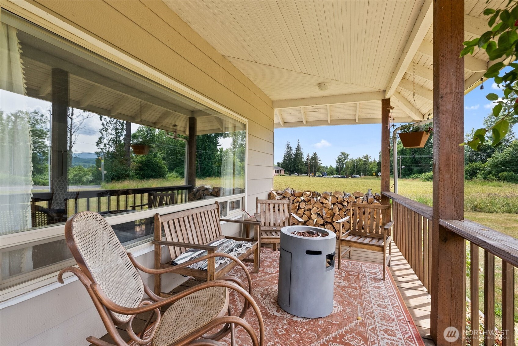 953 Boistfort Road Curtis, WA 98538 - Photo 4 of 40 a view of a chair and tables in the balcony