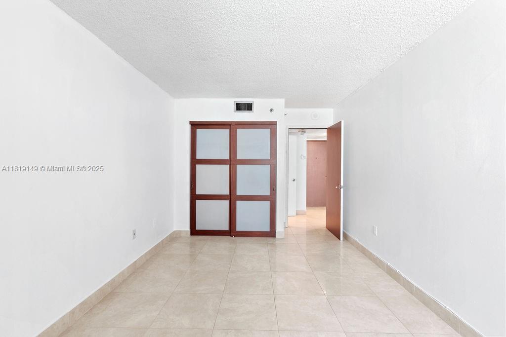 850 North Miami Avenue, Unit W1001 Miami, FL 33136 - Photo 13 of 30 a view of an empty room with a window