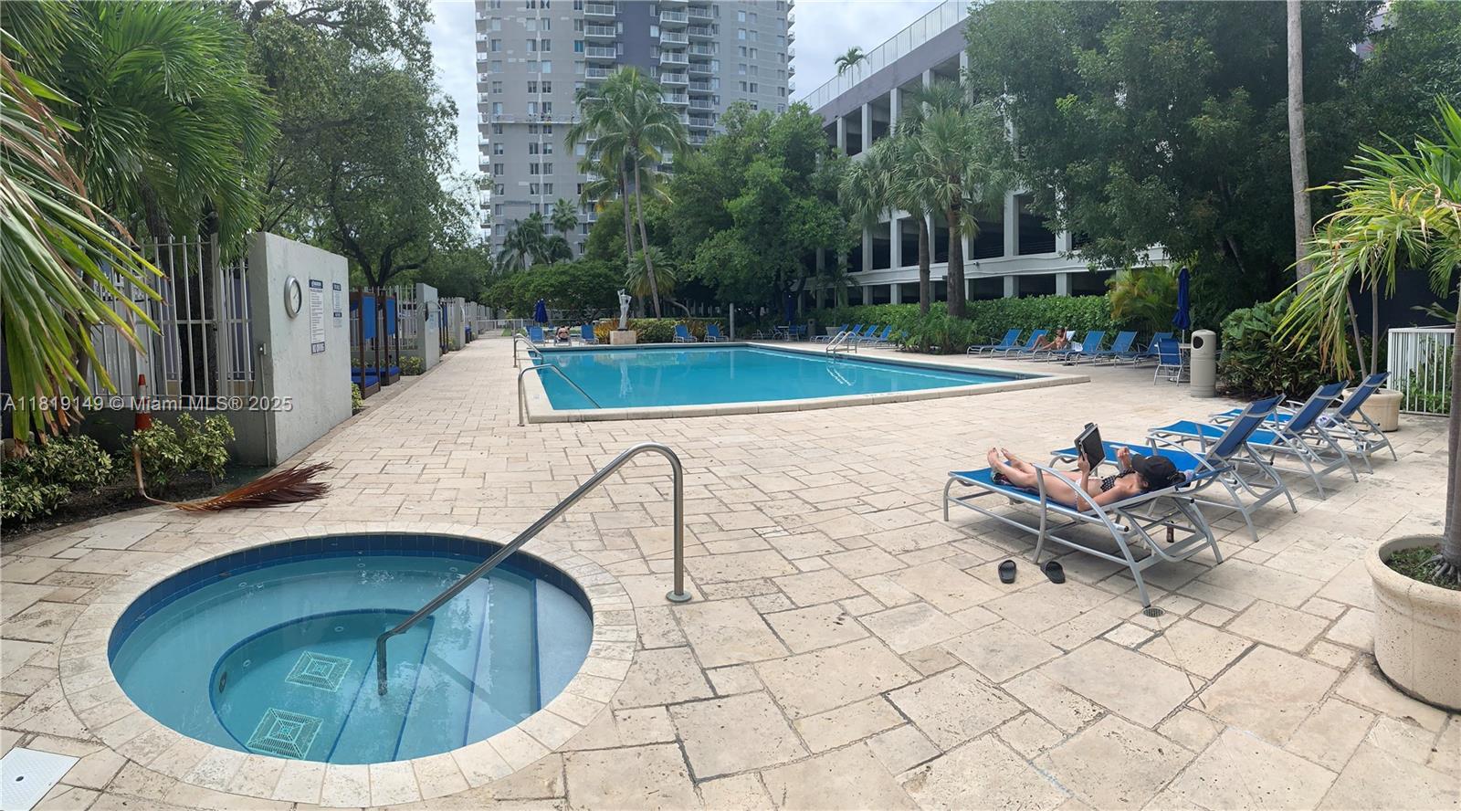 850 North Miami Avenue, Unit W1001 Miami, FL 33136 - Photo 17 of 30 a view of a swimming pool with a patio