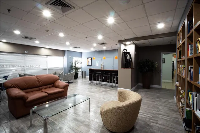 a view of a backyard with large trees