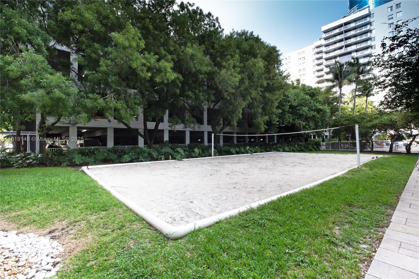 850 North Miami Avenue, Unit W1001 Miami, FL 33136 - Photo 24 of 30 a view of a backyard with large trees