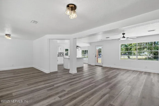 a view of a porch with a big yard