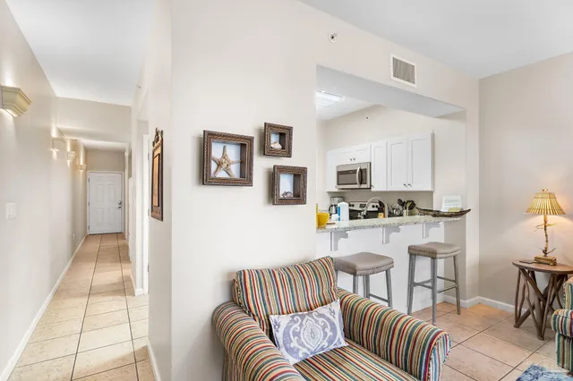 a kitchen with a sink and a stove top oven