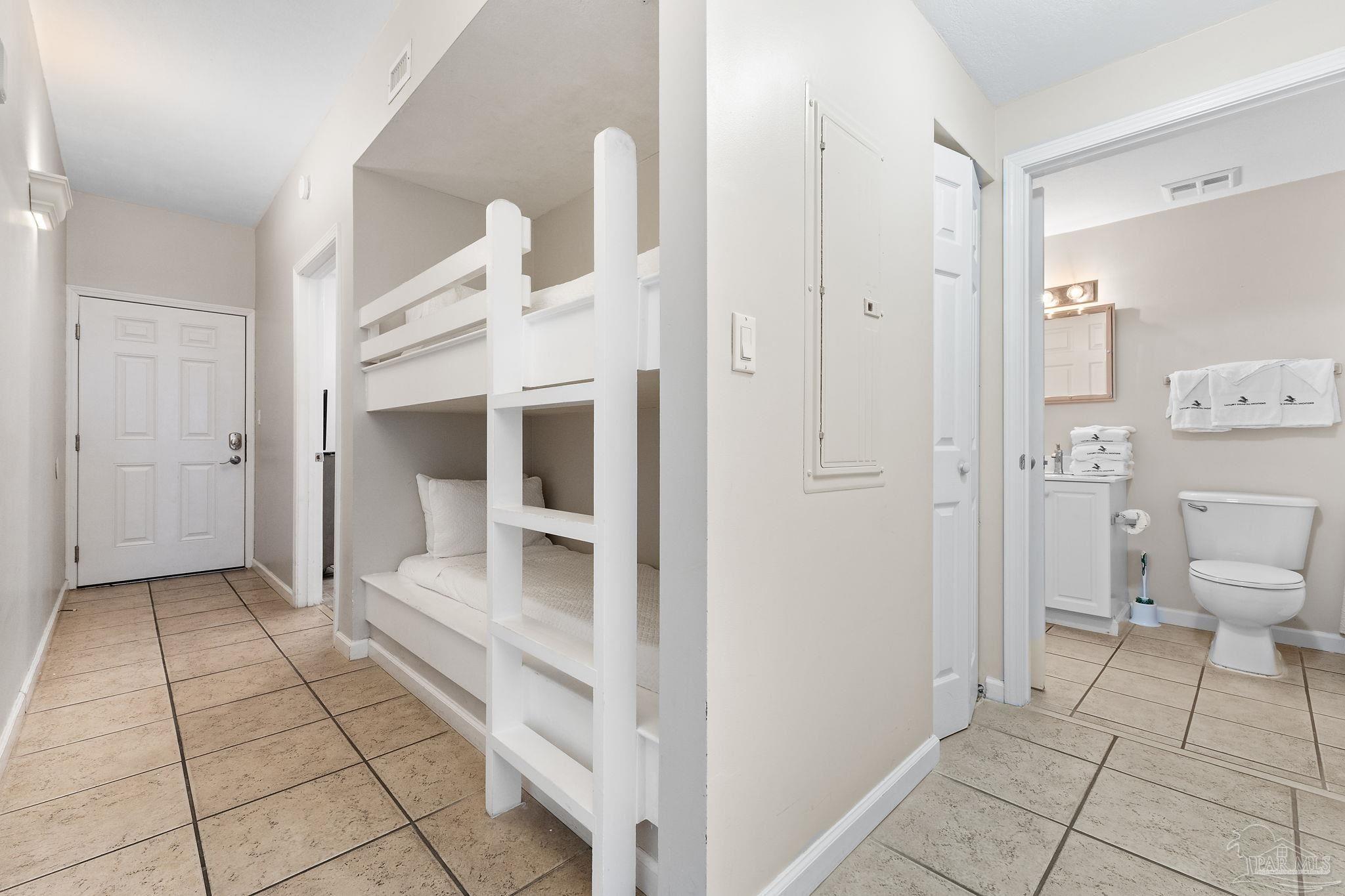 14511 Perdido Key Drive, Unit 904 Perdido Key, FL 32507 - Photo 19 of 64 a view of a bathroom with a sink and a toilet