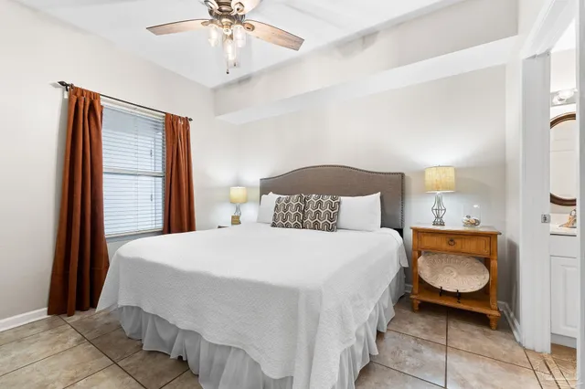 a bathroom with a toilet a sink and a mirror