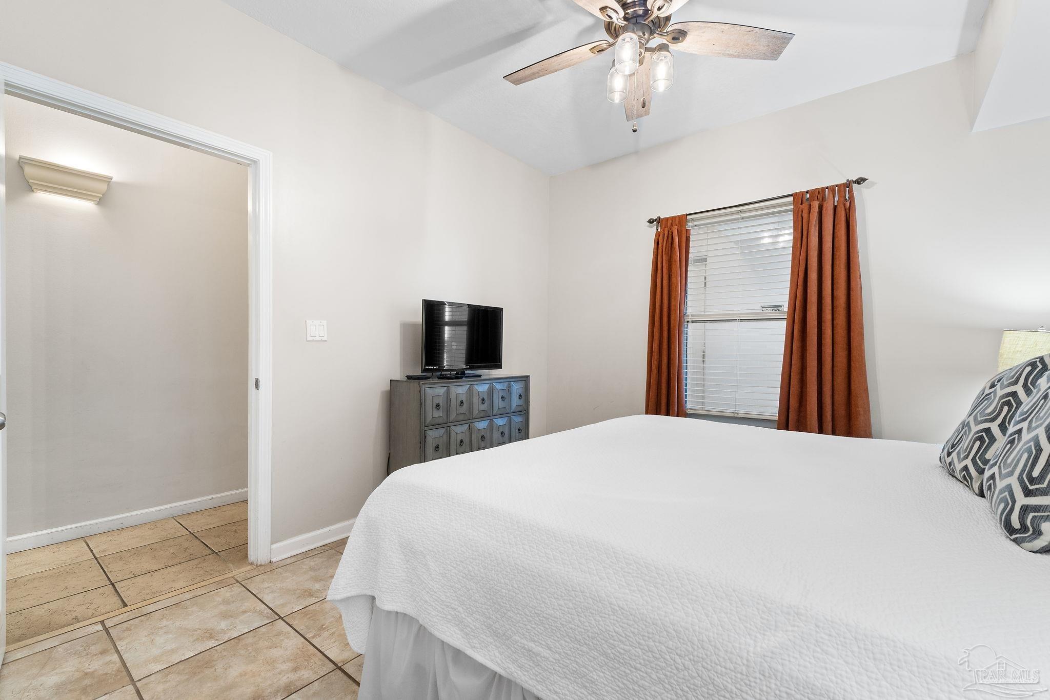 14511 Perdido Key Drive, Unit 904 Perdido Key, FL 32507 - Photo 22 of 64 a bedroom with a bed and a tv