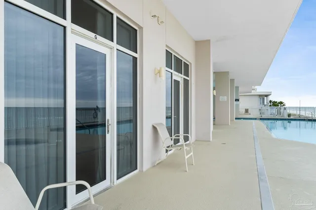 a bathroom with a shower and a sink