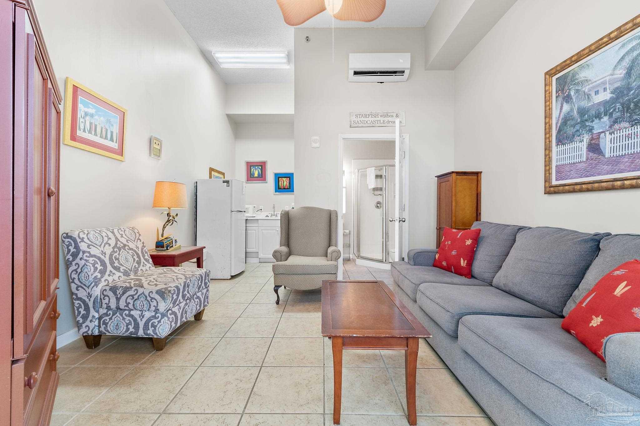 14511 Perdido Key Drive, Unit 904 Perdido Key, FL 32507 - Photo 34 of 64 a living room with furniture and a couch