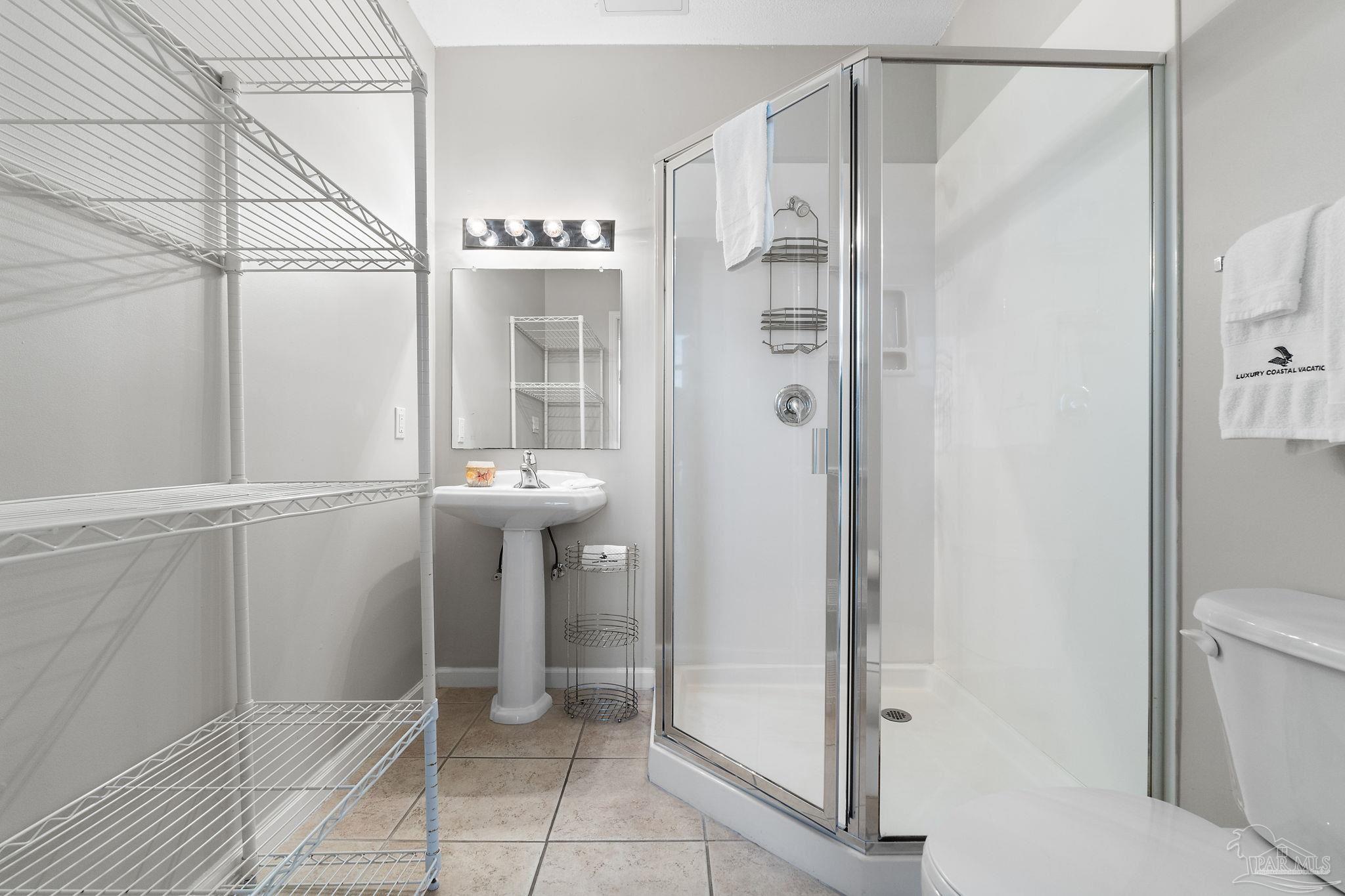 14511 Perdido Key Drive, Unit 904 Perdido Key, FL 32507 - Photo 38 of 64 a bathroom with a shower and a sink