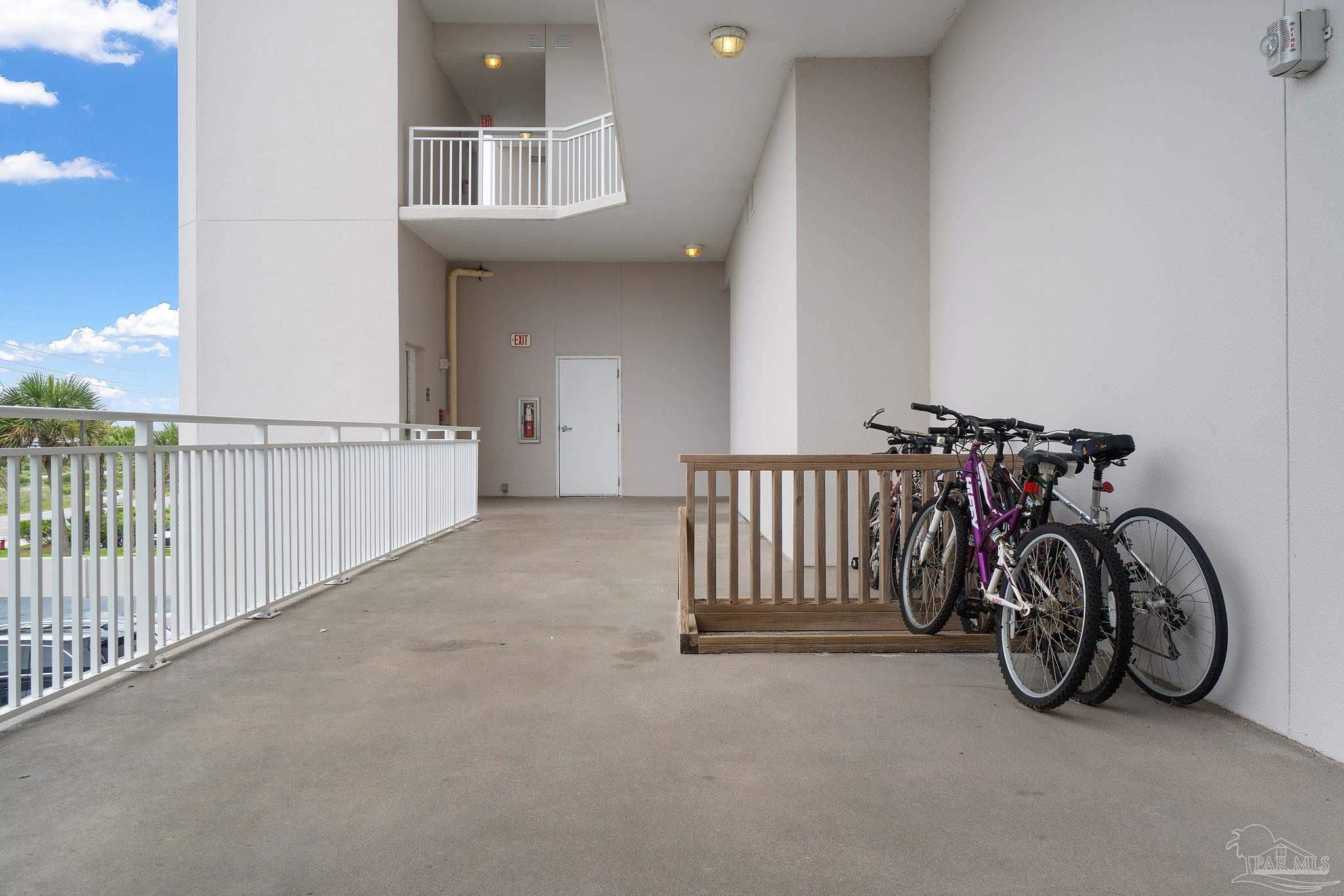 14511 Perdido Key Drive, Unit 904 Perdido Key, FL 32507 - Photo 46 of 64 a view of a livingroom with a cycle and more windows