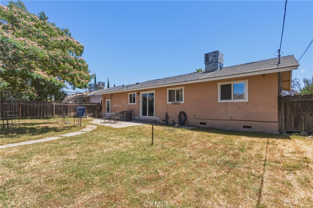 6812 Helton Street Winton, CA 95388 - Photo 20 of 24 a backyard of a house