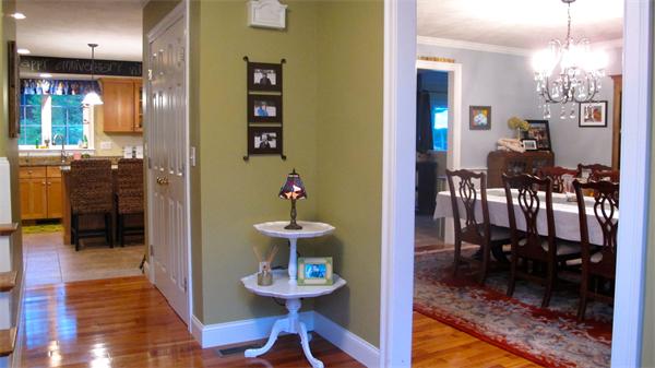 160 Barker Hill Road Townsend, MA 01469 - Photo 11 of 29 a view of a dining room with furniture and wooden floor