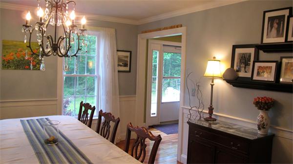 160 Barker Hill Road Townsend, MA 01469 - Photo 13 of 29 a view of a dining room with furniture and a chandelier