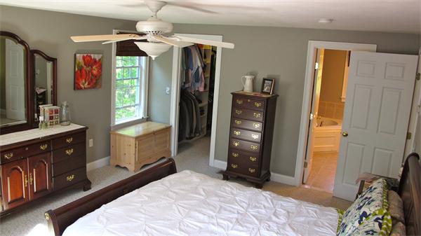 160 Barker Hill Road Townsend, MA 01469 - Photo 18 of 29 a bedroom with a bed dresser and a large mirror