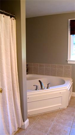160 Barker Hill Road Townsend, MA 01469 - Photo 22 of 29 a bathroom with a bathtub and shower