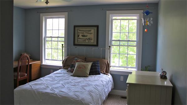 160 Barker Hill Road Townsend, MA 01469 - Photo 25 of 29 a bedroom with a bed and a window