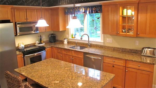 160 Barker Hill Road Townsend, MA 01469 - Photo 3 of 29 a kitchen with a stove a sink and a microwave