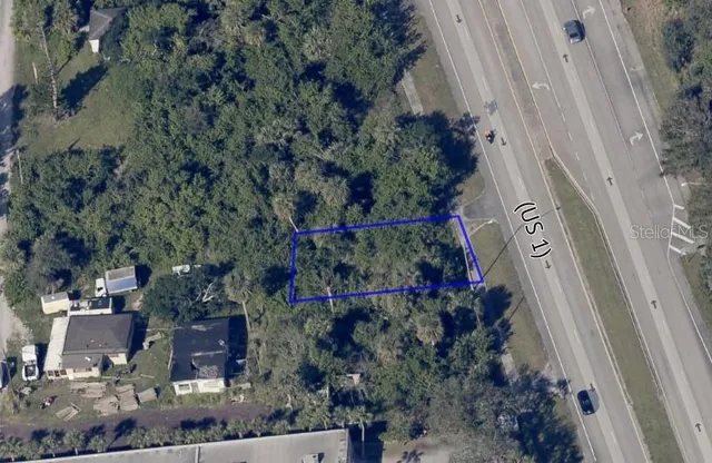 a view of a garden with a pathway