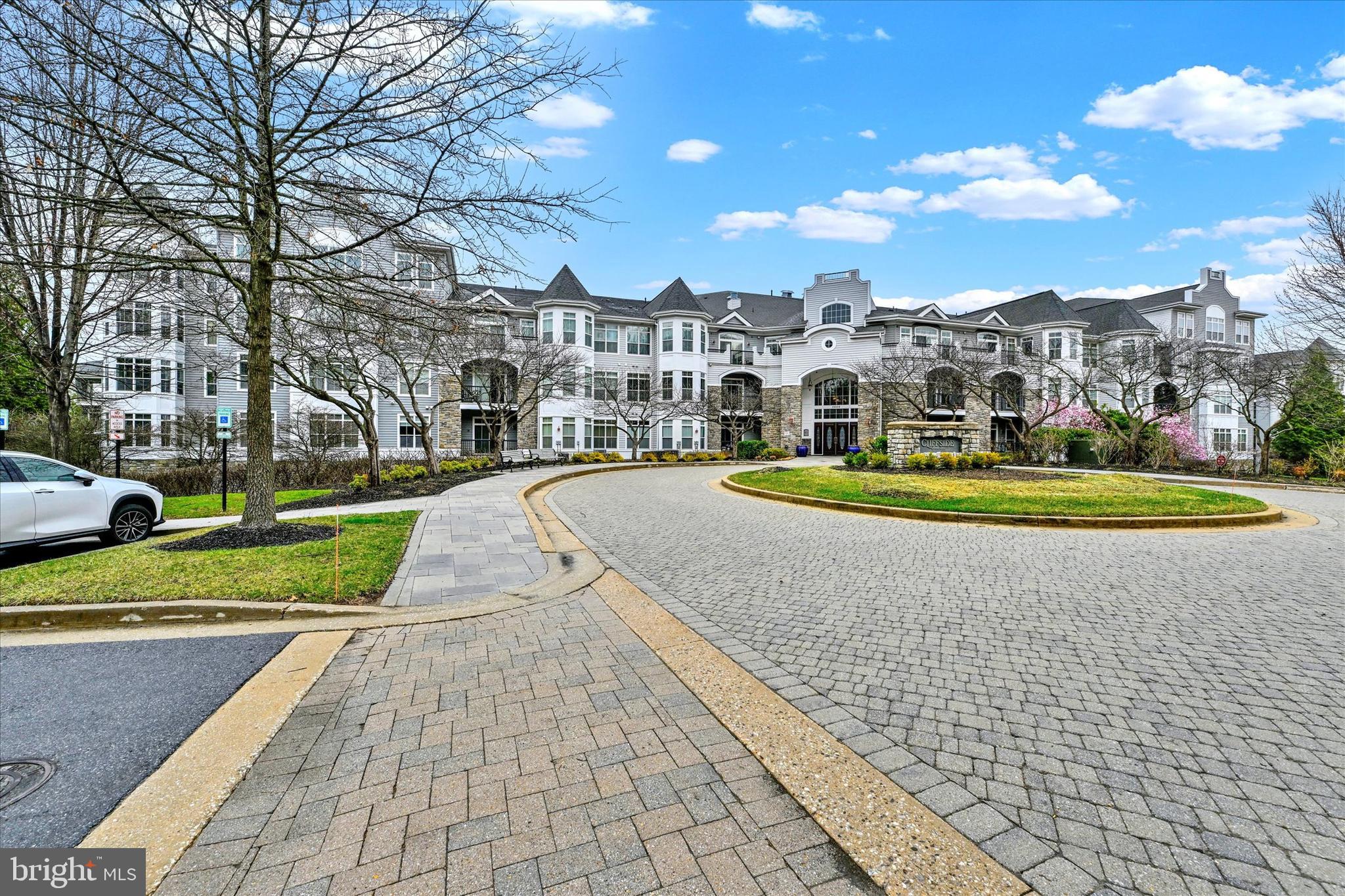 a view of a swimming pool with an outdoor seating