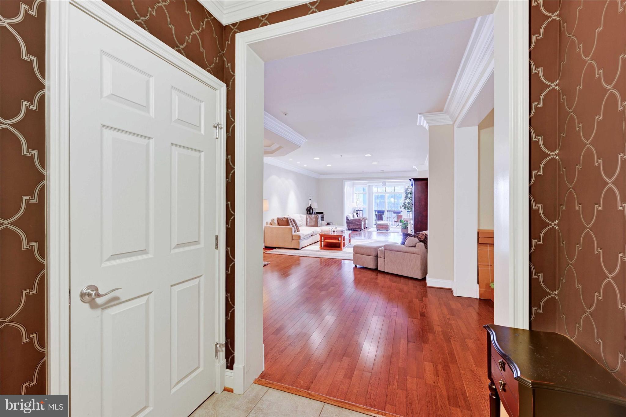 3000 Stone Cliff Drive, Unit 205 Baltimore, MD 21209 - Photo 28 of 28 a view of living room with furniture and a wooden floor